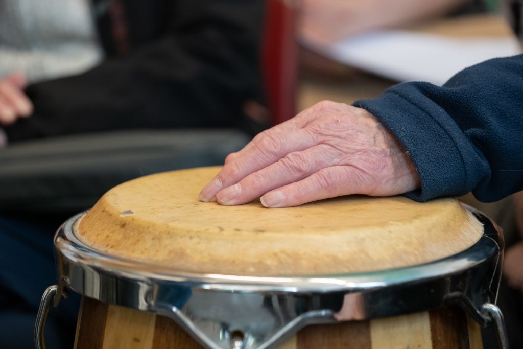 hand on top of a drum